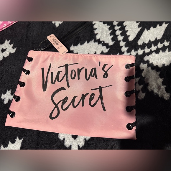 Victoria's Secret Handbags - Victoria's Secret Pink Clutch with Black Accents